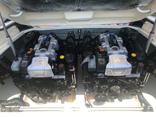 Slide: The Image of 2019 Chris-Craft Launch 34 engine compartment with dual inboard motors. - 9