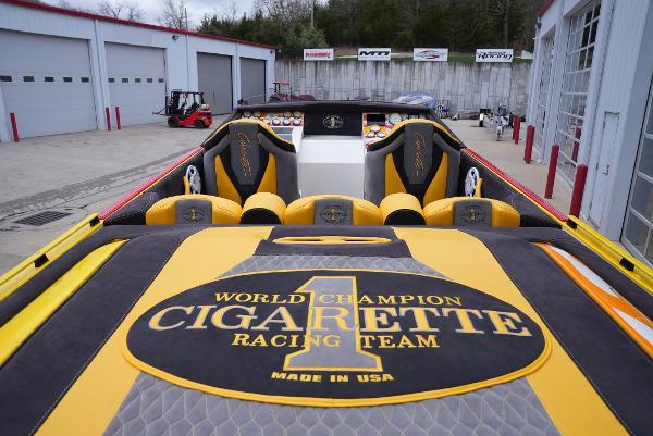 Slide: The Image of 2005 Cigarette 38 Top Gun boat interior with World Champion Racing Team branding. - 11