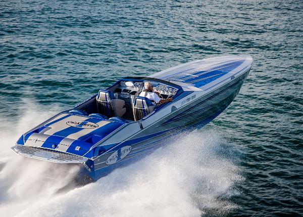 Slide: The Image of 2025 Cigarette 38 Top Gun speedboat cruising on water. - 1