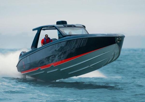 Slide: The Image of 2024 Cigarette 41 Nighthawk speedboat cruising on the water. - 1