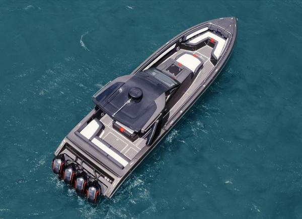 Slide: The Image of 2024 Cigarette 41 Nighthawk luxury speedboat cruising on blue ocean water. - 3