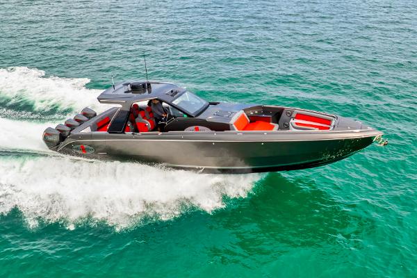 Slide: The Image of 2025 Cigarette 42 Nighteagle speedboat cruising on clear blue water. - 1