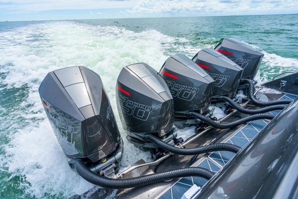 Slide: The Image of 2025 Cigarette 42 Nighteagle with quad Mercury 450R outboard engines on the water. - 18
