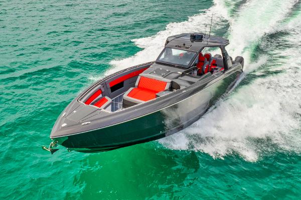 Slide: The Image of 2025 Cigarette 42 Nighteagle speedboat cruising on turquoise water. - 2