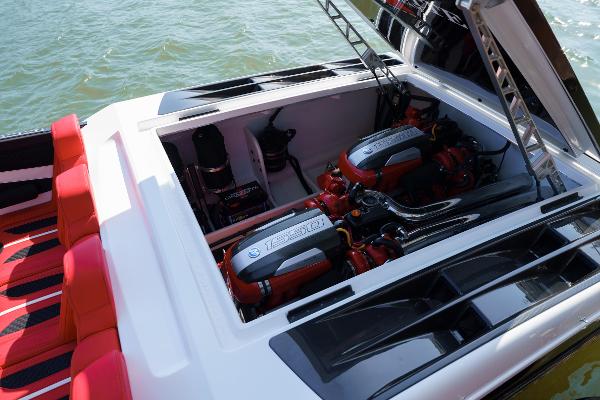 Slide: The Image of 2022 Cigarette 515 boat engine compartment with twin high-performance engines. - 8