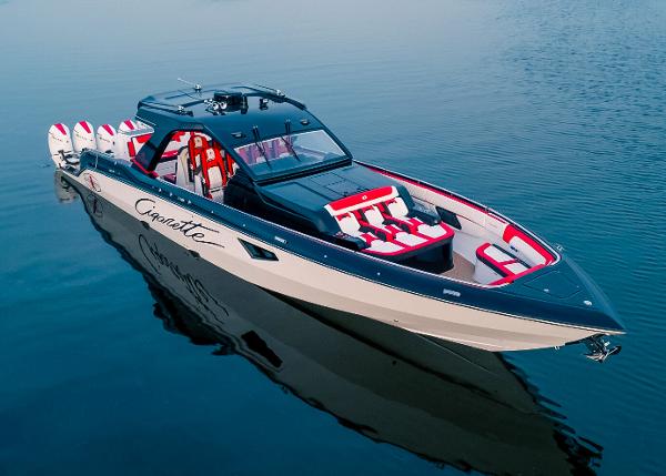 Slide: The Image of 2025 Cigarette 52 Thunder boat on calm water, featuring sleek design and powerful engines. - 0