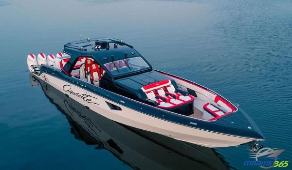 Slide: The Image of 2024 Cigarette 52 Thunder speedboat on calm water. - 0