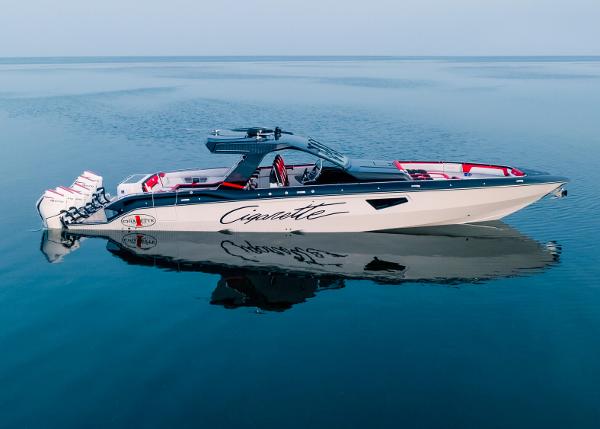 Slide: The Image of 2025 Cigarette 52 Thunder boat on calm water. - 1