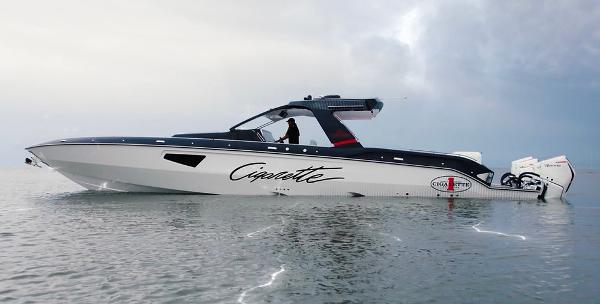 Slide: The Image of 2025 Cigarette 52 Thunder boat on calm water. - 29