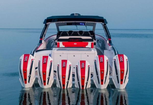 Slide: The Image of 2024 Cigarette 52 Thunder boat with six powerful outboard engines. - 3