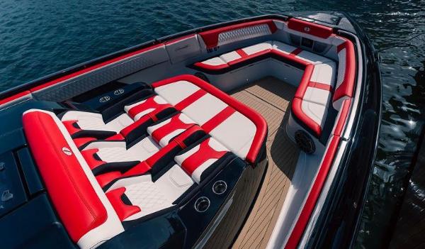 Slide: The Image of 2024 Cigarette 52 Thunder boat with luxurious red and white seating. - 6