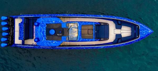 Slide: The Image of Top view of a 2024 Cigarette 59 Tirranna luxury speedboat in blue. - 12