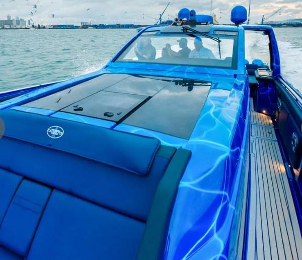 Slide: The Image of 2024 Cigarette 59 Tirranna luxury speedboat cruising on the water. - 3