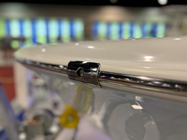 Slide: The Image of Close-up of Clearwater 2000 boat, 2024 model, showcasing sleek chrome detailing. - 2
