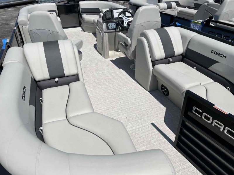 Slide: The Image of 2023 Coach 223 RFC boat interior with luxurious seating and modern dashboard. - 8