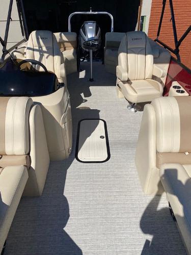 Slide: The Image of 2023 Coach Pontoons 223RFC interior with beige seating and modern design. - 5