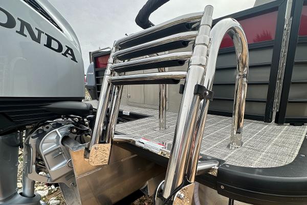 Slide: The Image of 2023 Coach Pontoons 243PFC with Honda engine and stainless steel ladder. - 10