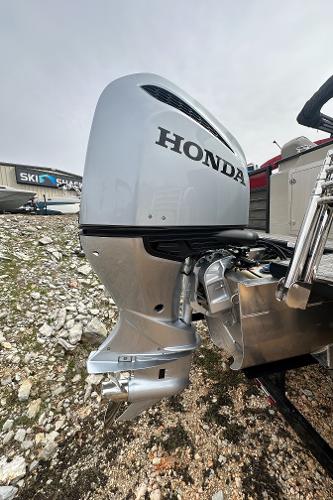 Slide: The Image of 2023 Coach Pontoons 243PFC with Honda outboard motor. - 11
