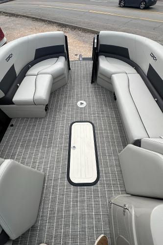 Slide: The Image of 2023 Coach Pontoons 243PFC interior with gray seating and flooring. - 3