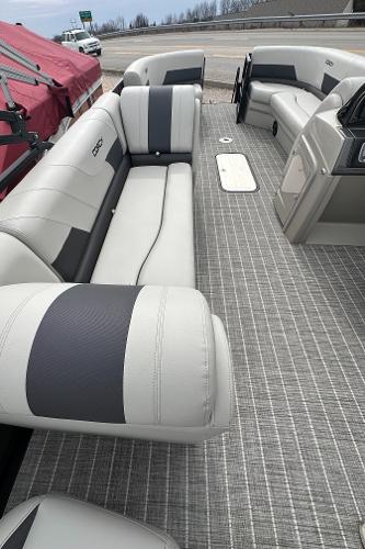 Slide: The Image of 2023 Coach Pontoons 243PFC interior with gray and white seating. - 7