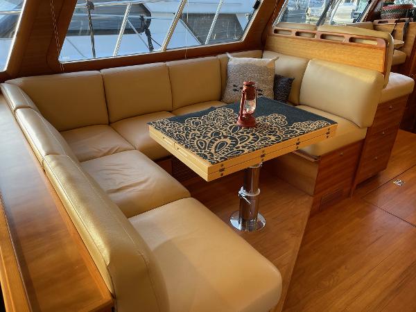 Slide: The Image of Luxurious interior of 2012 Coastal Craft 56 yacht with elegant seating and decorative table. - 31
