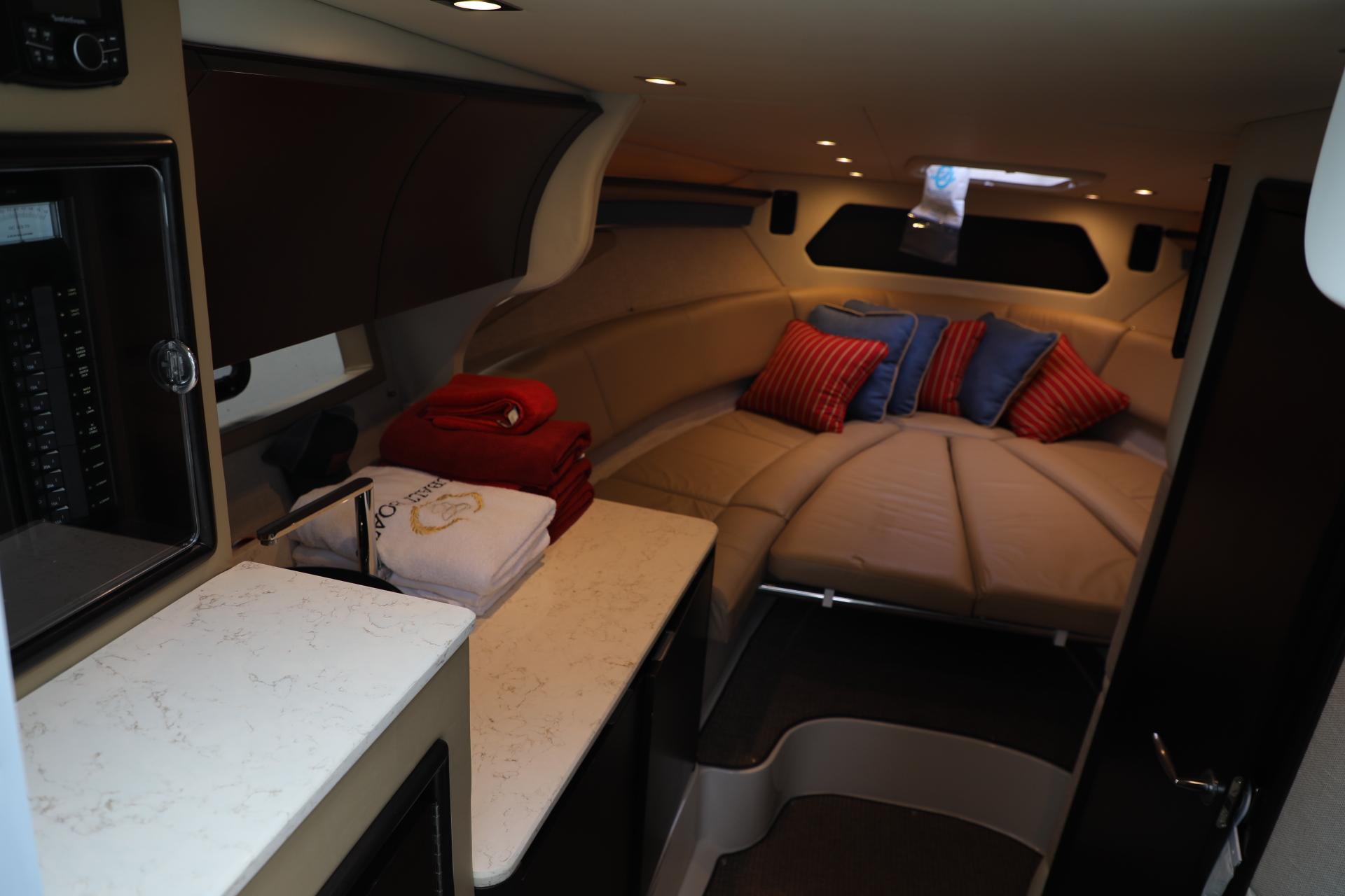 Slide: The Image of Luxurious interior of a 2016 Cobalt A40 boat with cozy seating and modern amenities. - 17