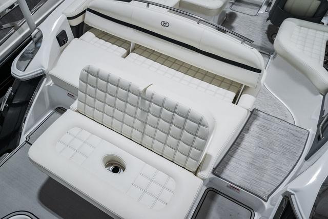 Slide: The Image of 2021 Cobalt R5 Surf boat interior with white quilted seating and sleek design. - 10