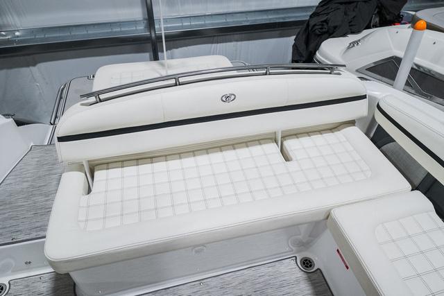 Slide: The Image of 2021 Cobalt R5 Surf boat interior with white cushioned seating. - 11