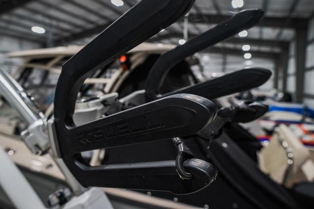 Slide: The Image of Close-up of 2021 Cobalt R5 Surf boat accessory in a showroom. - 14