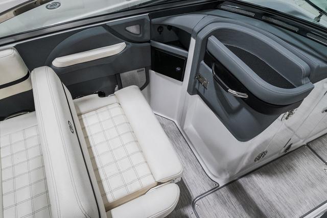 Slide: The Image of 2021 Cobalt R5 Surf boat interior with white seating and modern dashboard design. - 19