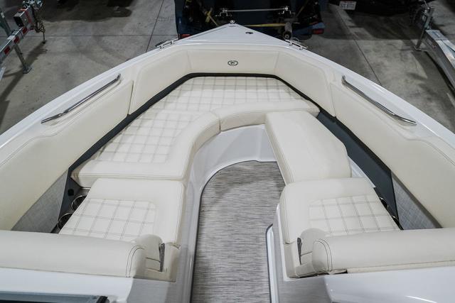 Slide: The Image of 2021 Cobalt R5 Surf boat with luxurious white seating and spacious interior. - 28