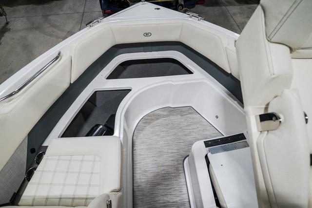 Slide: The Image of 2021 Cobalt R5 Surf boat interior with white seating and modern design. - 29