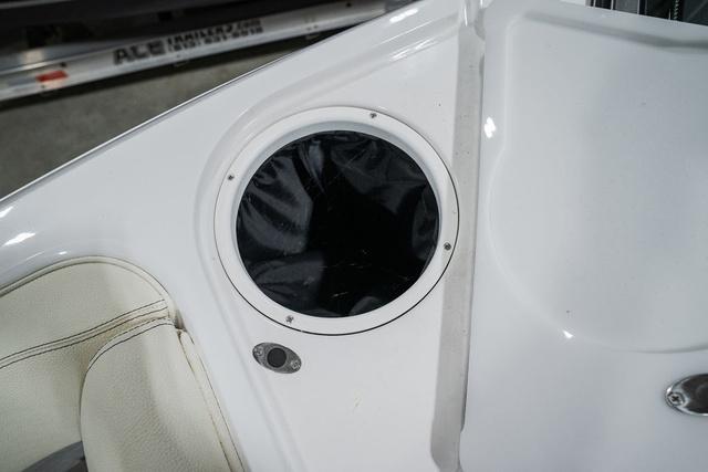 Slide: The Image of Cobalt R5 Surf 2021 boat interior detail with circular compartment and seating. - 31