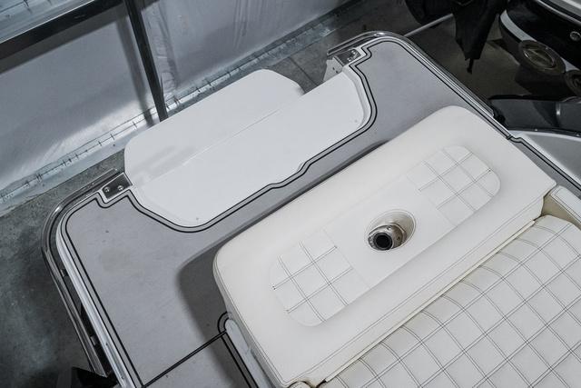 Slide: The Image of 2021 Cobalt R5 Surf boat interior with white cushioned seating. - 8