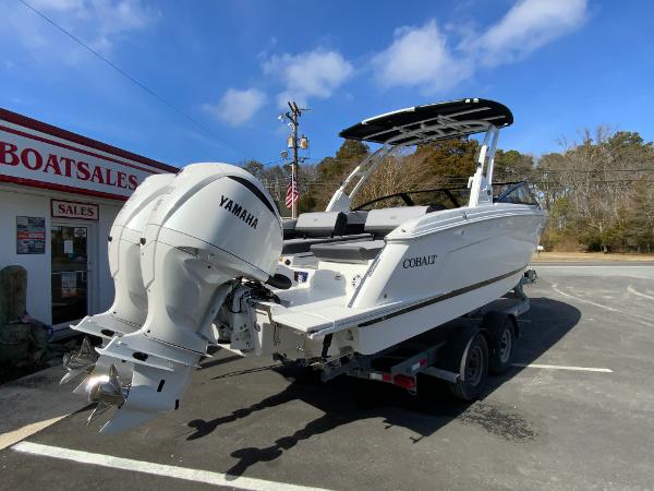 Slide: The Image of 2024 Cobalt R8 Outboard boat with Yamaha engines at a boat sales lot. - 10