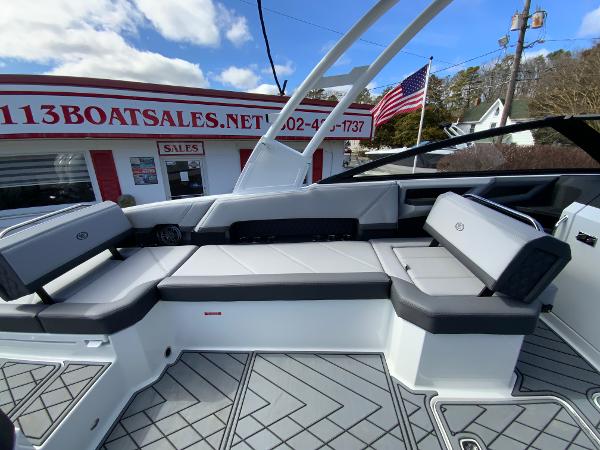 Slide: The Image of 2024 Cobalt R8 Outboard boat interior with gray seating and flooring. - 19