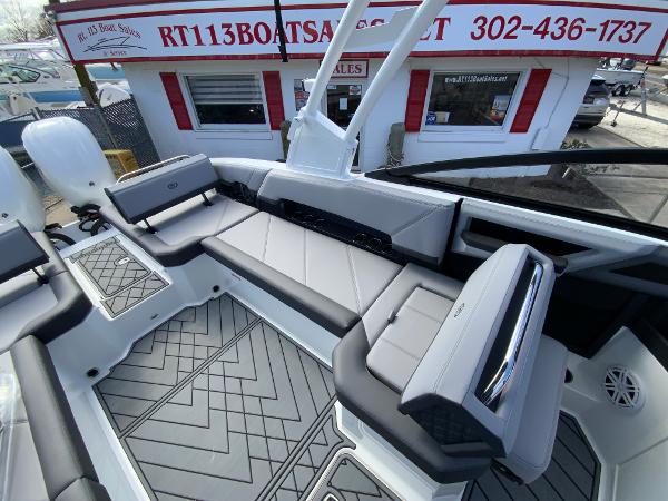 Slide: The Image of 2024 Cobalt R8 Outboard boat interior with gray seating and modern design at RT113 Boat Sales. - 22