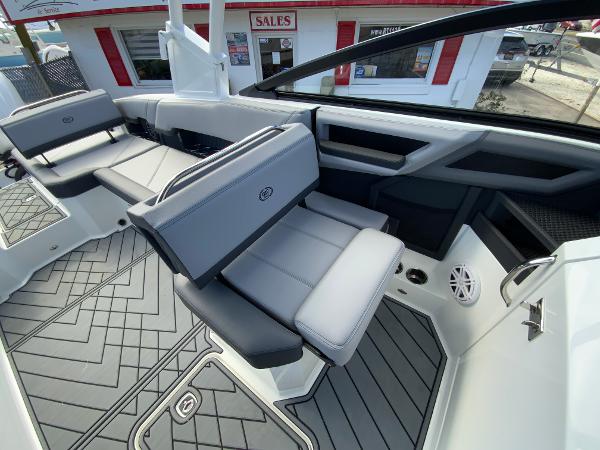 Slide: The Image of 2024 Cobalt R8 Outboard boat interior with gray seating and modern design. - 24