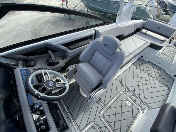 Slide: The Image of 2024 Cobalt R8 Outboard boat interior with modern helm and luxurious seating. - 31