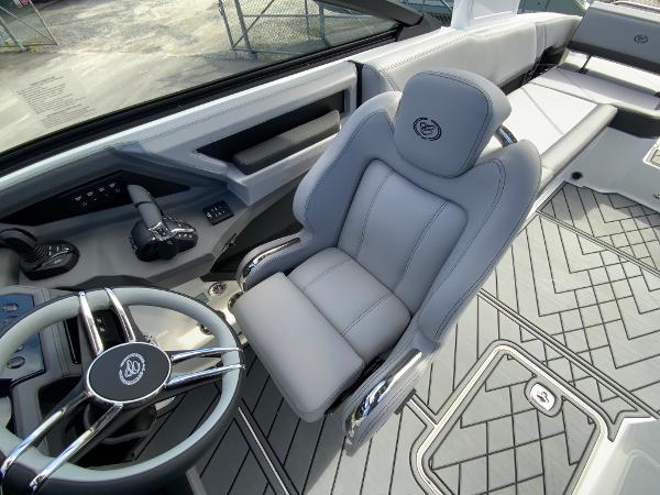 Slide: The Image of 2024 Cobalt R8 Outboard boat interior with steering wheel and captain's chair. - 32