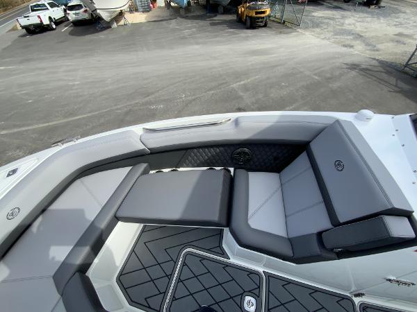Slide: The Image of 2024 Cobalt R8 Outboard boat interior with gray and black seating. - 39