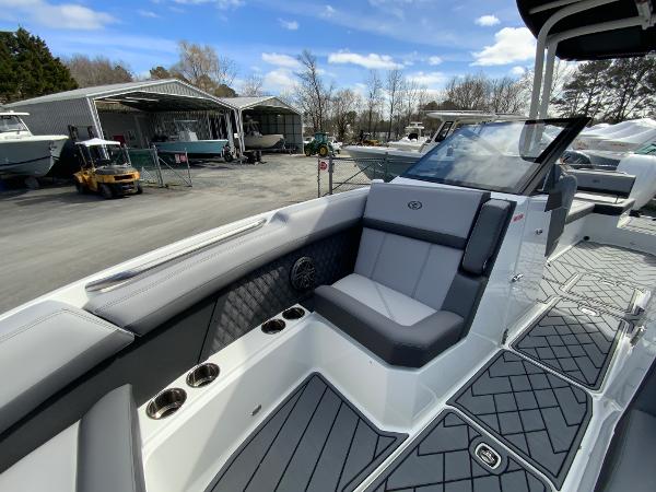 Slide: The Image of 2024 Cobalt R8 Outboard boat interior with gray seating and diamond-patterned accents. - 40