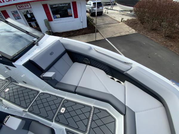Slide: The Image of 2024 Cobalt R8 Outboard boat interior with gray seating and black accents. - 42