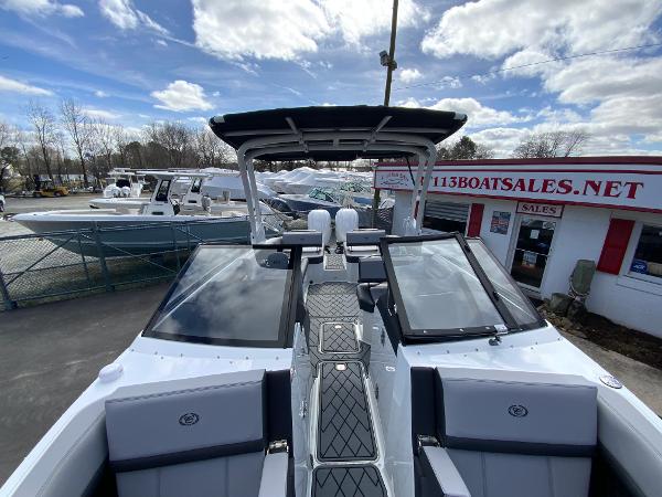 Slide: The Image of 2024 Cobalt R8 Outboard boat at dealership, showcasing sleek design and modern features. - 43