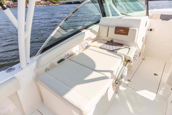 Slide: The Image of Manufacturer Provided Image: 2023 Cobia 240 Dual Console boat interior with comfortable seating. - 11