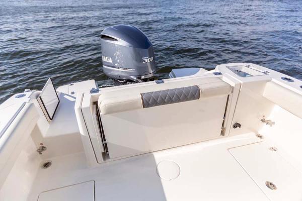 Slide: The Image of Manufacturer Provided Image: 2023 Cobia 240 Dual Console boat with Yamaha 300 engine on water. - 13