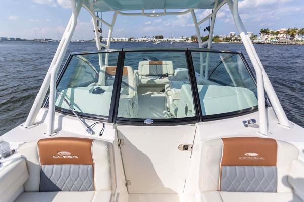Slide: The Image of Manufacturer Provided Image: 2023 Cobia 240 Dual Console boat interior on the water. - 6