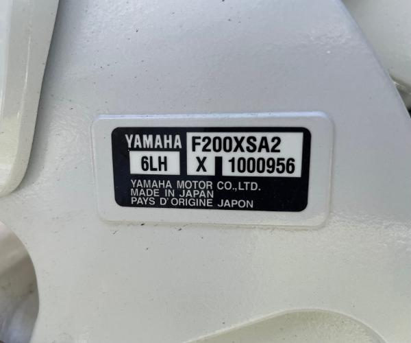 Slide: The Image of Yamaha F200XSA2 engine label on 2024 Cobia 262 Center Console boat. - 12