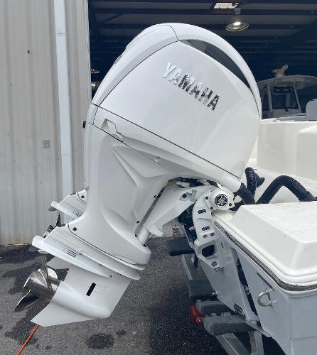 Slide: The Image of 2024 Cobia 262 Center Console with Yamaha outboard motor. - 6