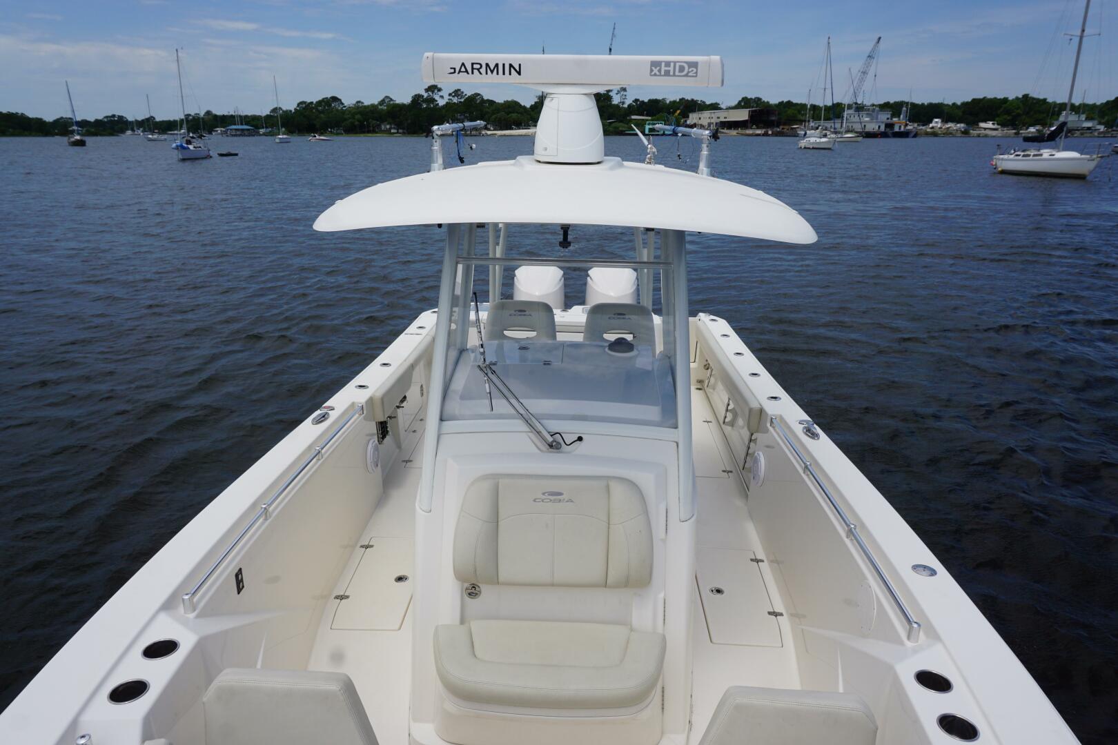 Slide: The Image of 2019 32 Cobia 320 CC SANTIAGO Aft View - 4411235